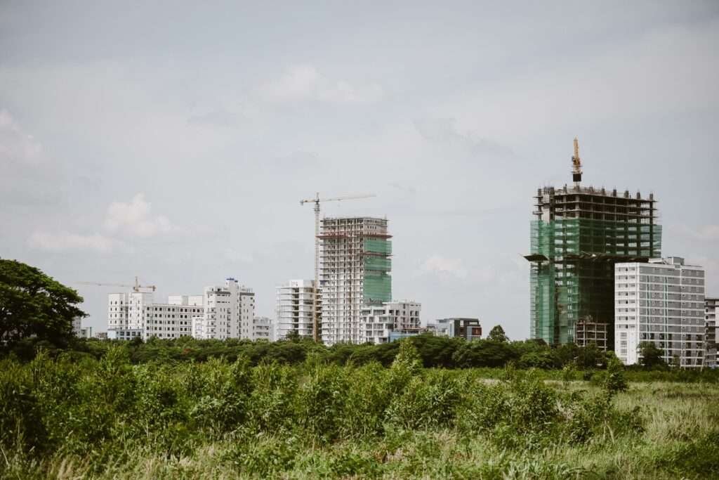 baic-North East's Biggest Building, Architecture, Interiors & Construction Exhibition in guwahati Northeast India construction industry high-rise building development, Building materials Northeast India urban construction growth, Construction business Northeast India skyline development with cranes,